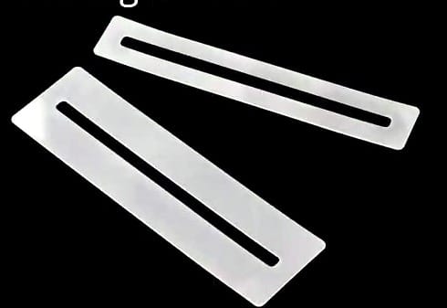 Two stainless steel fingerboard guards